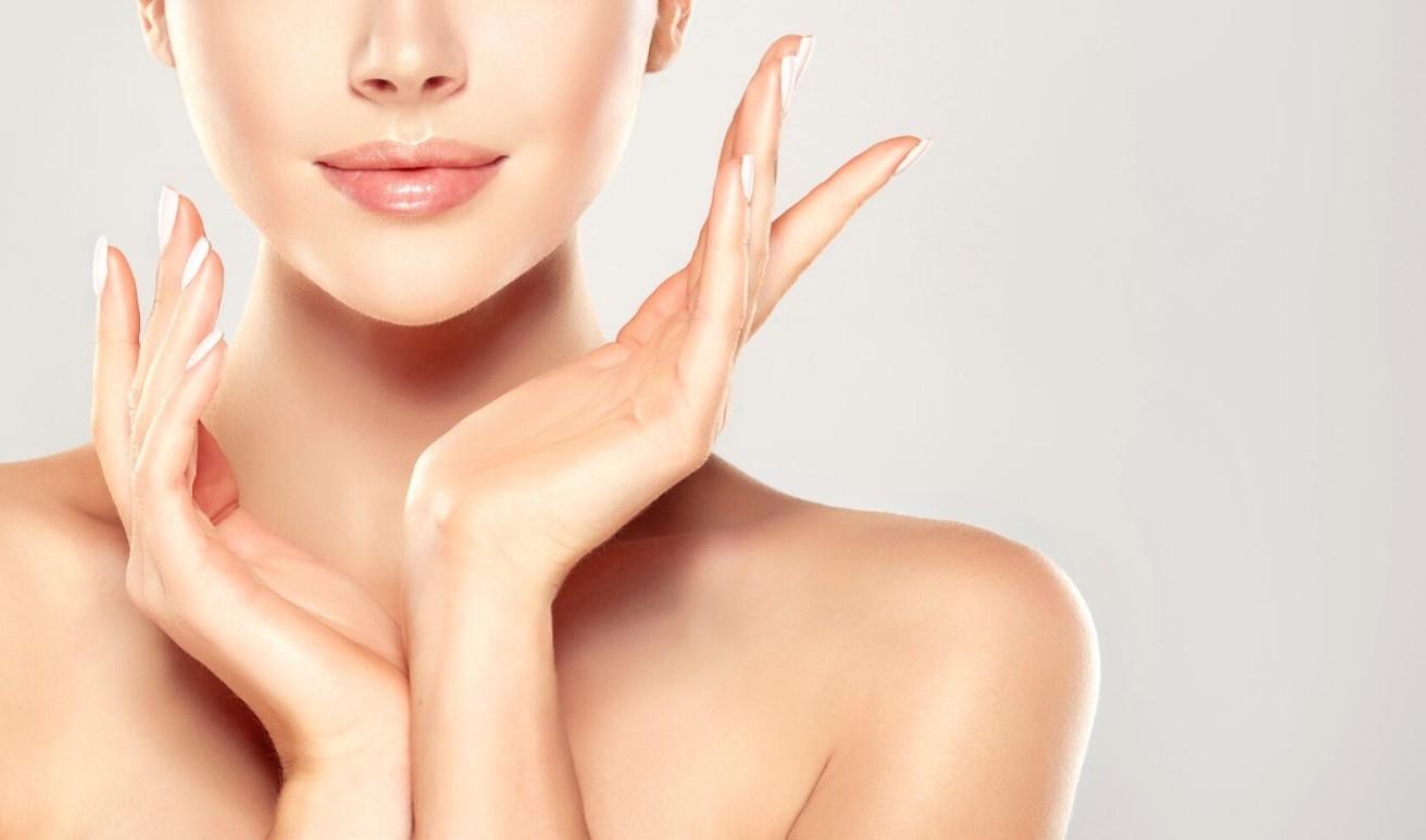 Vitamin C serum with oranges showing natural glowing skin benefits for women