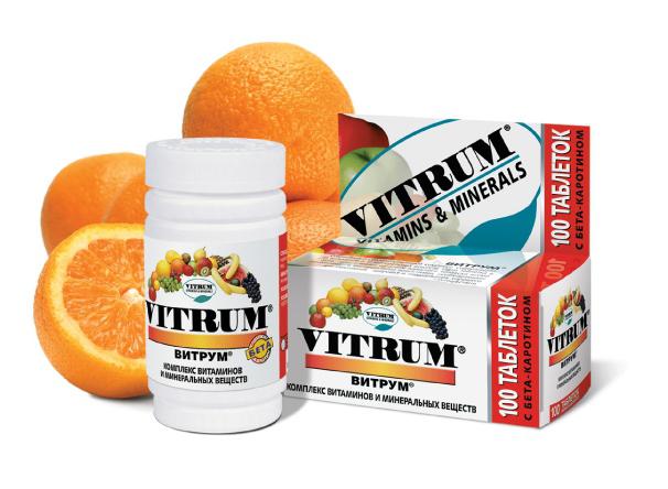 
Alt Text
A product shot of Vitrum brand vitamins and minerals, showing a white plastic bottle and a red and white box. Oranges, some sliced, are arranged around the products to suggest their contents. The labels and packaging are in both English and Russian.

